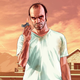 A man in a white shirt stands in front of a house while holding up a lighter.